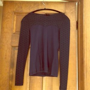 Navy blue top with see through neck and arms.